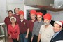 Lions serving crew in kitchen